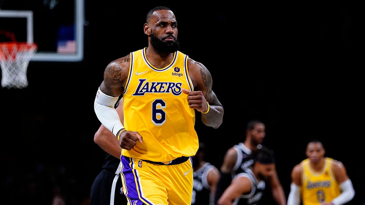 Los Angeles Lakers' LeBron James (6) reacts during the second half of an NBA basketball game against the Brooklyn Nets Tuesday, Jan. 25, 2022 in New York. The Lakers won 106-96.