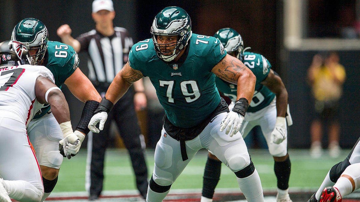 FILE - Philadelphia Eagles offensive guard Brandon Brooks (79) looks to block during the first half of an NFL football game against the Atlanta Falcons, on Sept. 12, 2021, in Atlanta. Brooks announced his retirement Wednesday, Jan. 26, 2022, after 10 seasons in the NFL.