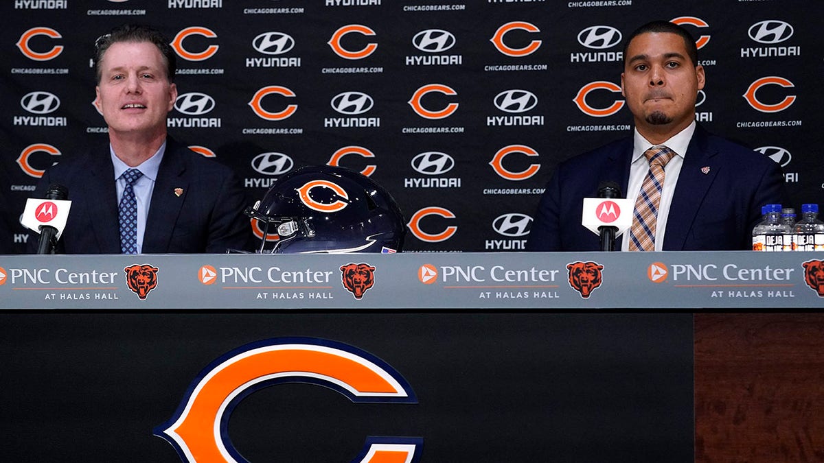 Chicago Bears new NFL football team head coach Matt Eberflus, left, and new general manager Ryan Poles listen to a question during a news conference at Halas Hall in Lake Forest, Ill., Monday, Jan. 31, 2022.