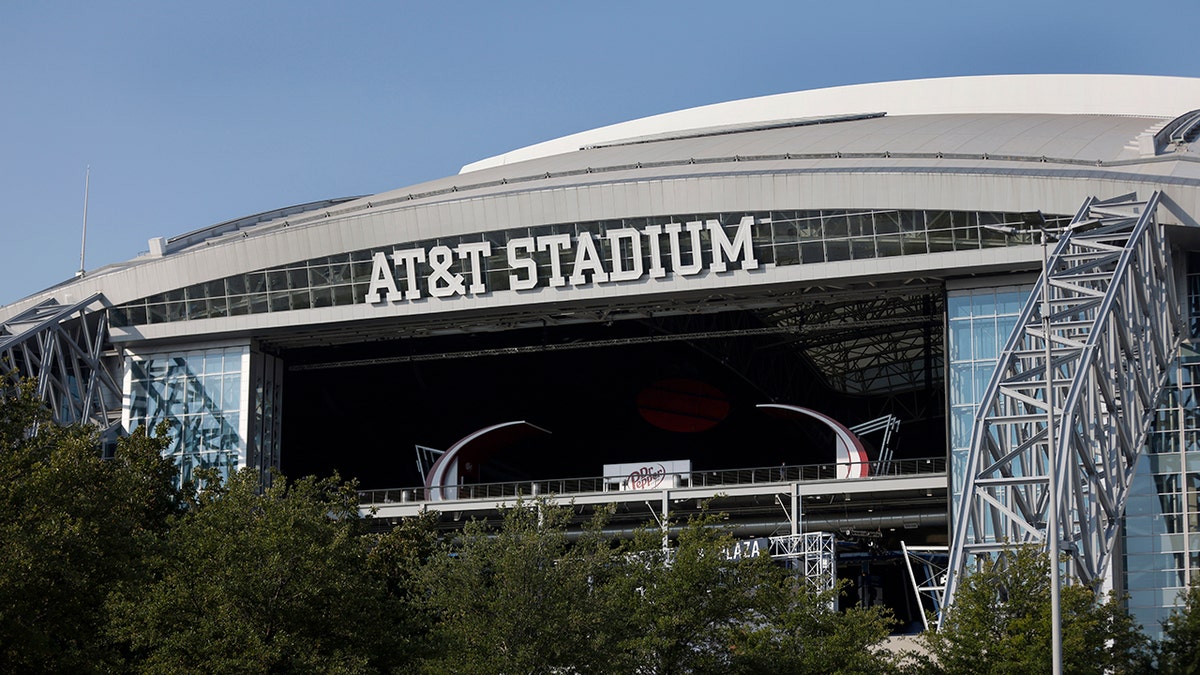 FILE - The outside of AT&T Stadium is shown with the end zone doors open before an NFL football game between the Dallas Cowboys and the Cleveland Browns in Arlington, Texas, Sunday, Oct. 4, 2020.