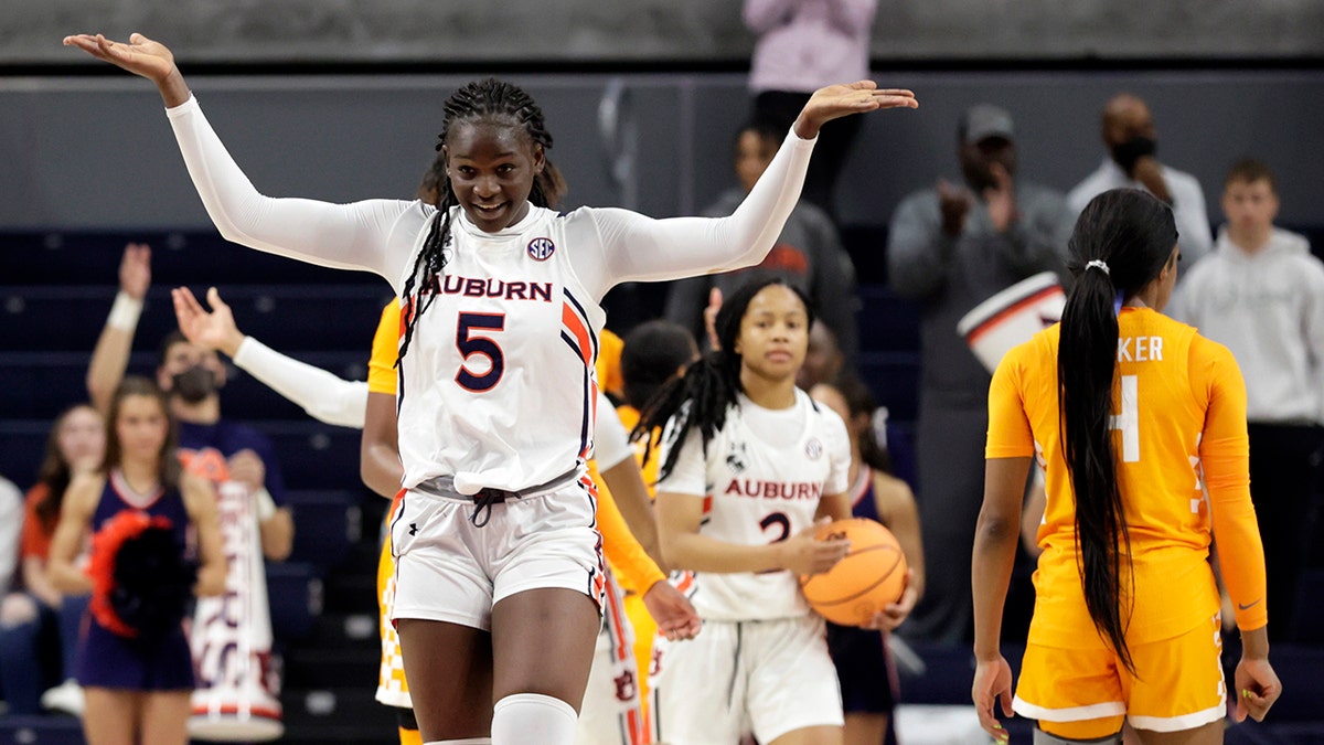 Auburn guard Aicha Coulibaly (5) reacts after a turnover during the second half of an NCAA college basketball game against Tennessee, Thursday, Jan. 27, 2022, in Auburn, Ala.
