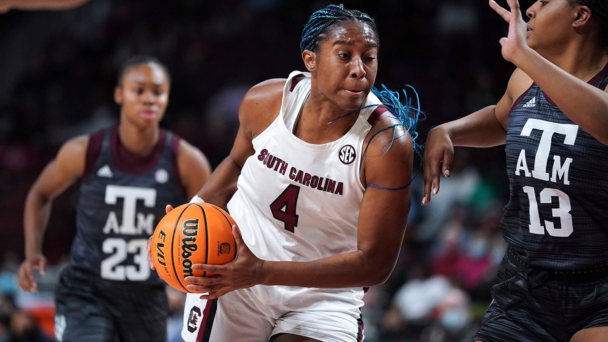 South Carolina forward Aliyah Boston (4) drives to the hoop against Texas A&M forward Jada Malone (13) during the first half of an NCAA college basketball game Thursday, Jan. 13, 2022, in Columbia, S.C.
