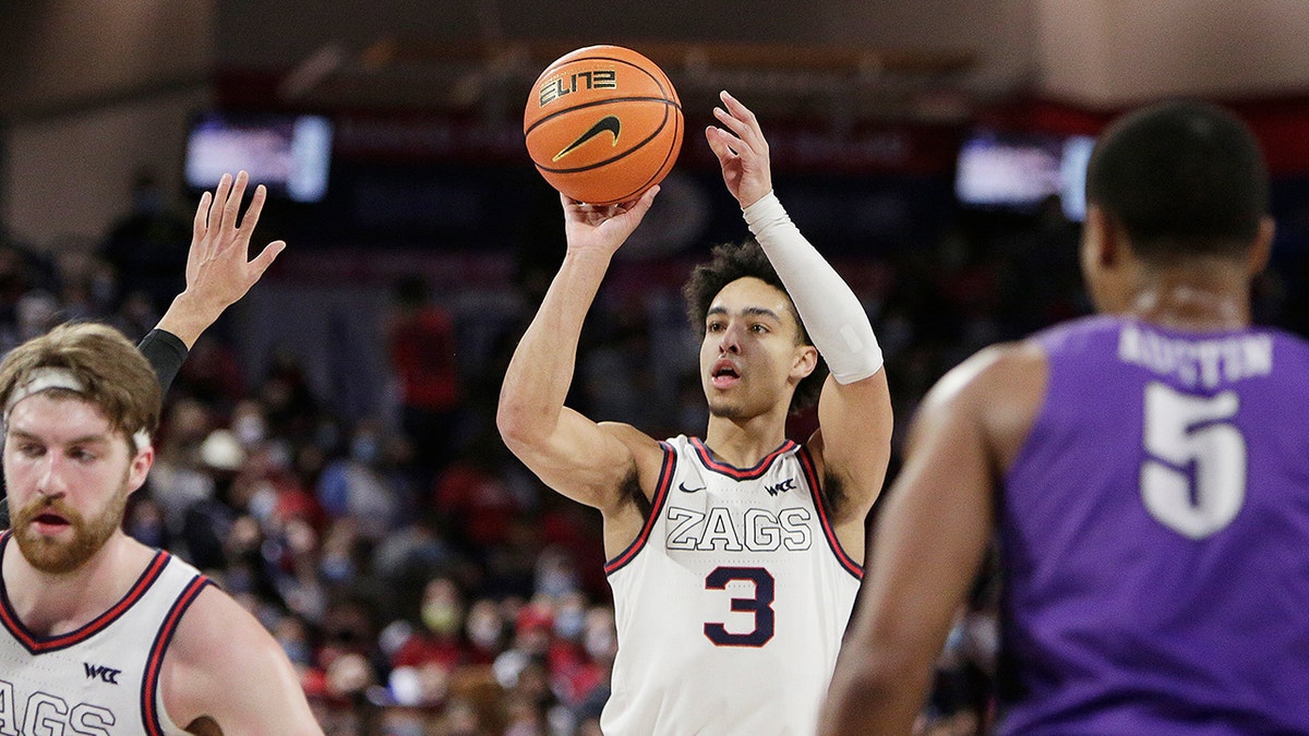 Gonzaga guard Andrew Nembhard (3) shoots during the first half of an NCAA college basketball game against Portland, Saturday, Jan. 29, 2022, in Spokane, Wash.