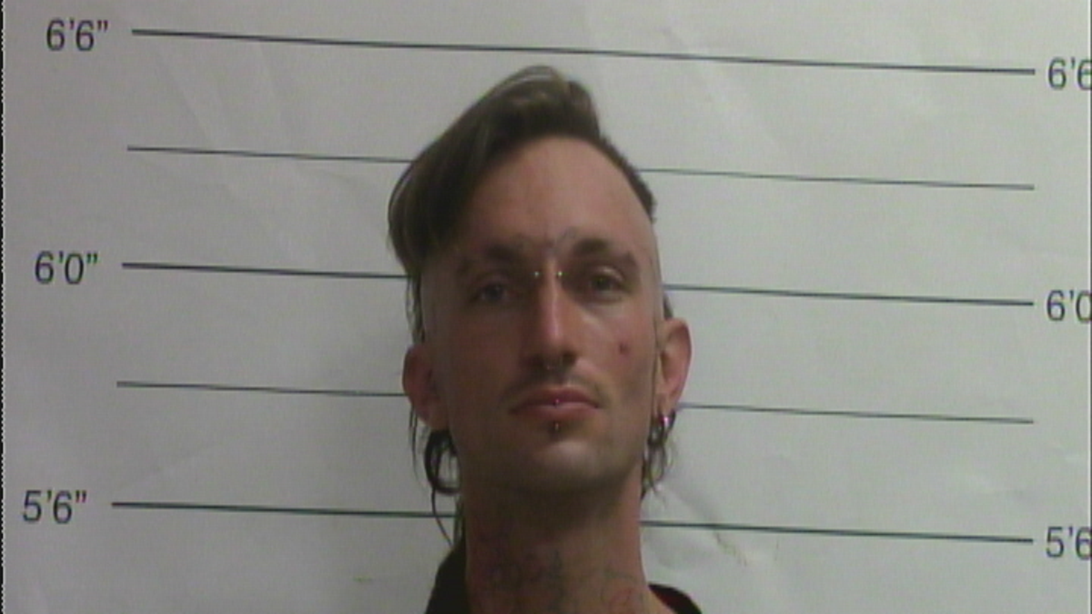 Benjamin Beale is accused of running a meth lab at a home where police also found a woman's dismembered body in a freezer.