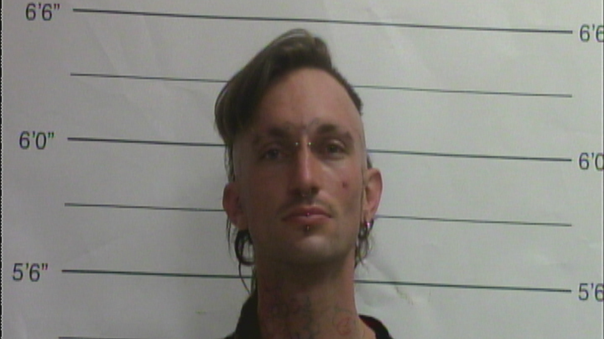 Benjamin Beale is accused of running a meth lab at a home where police also found a woman's dismembered body in a freezer.
