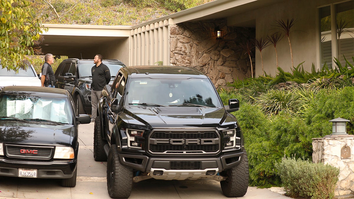 Private security guard the home in Beverly Hills where Jacqueline Avant, the wife of music producer Clarence Avant, was shot and killed. (Al Seib / Los Angeles Times via Getty Images).