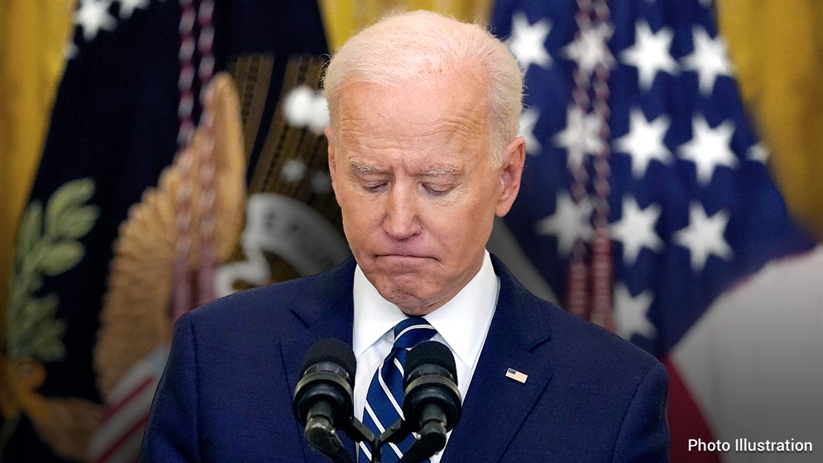Joe Biden looking down at his podium