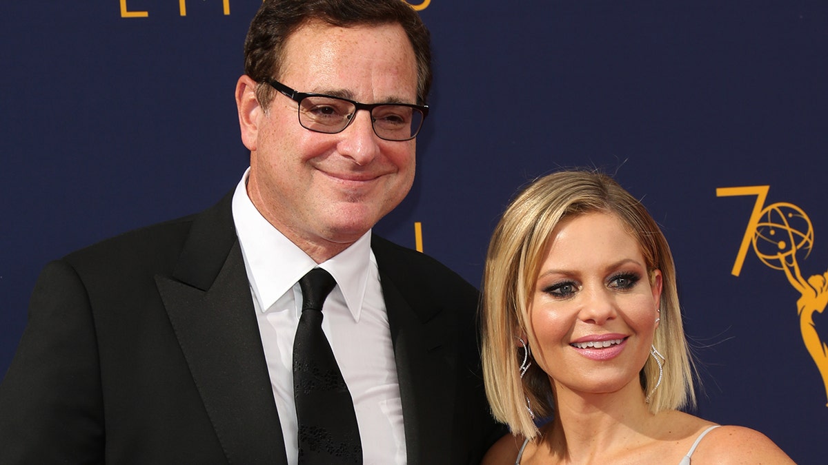 Candace Cameron Bure (right) shared a touching tribute to her TV dad, Bob Saget (left).