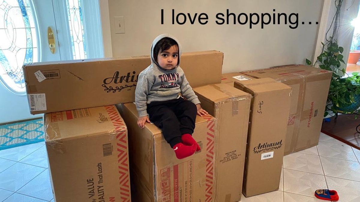 baby with boxes