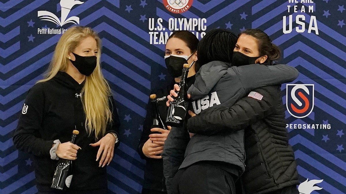 Erin Jackson and Brittany Bowe hug in front of Mia Kilburg-Manganello and Kimi Goetz after being nominated for 2022 on Jan 9, 2022, Milwaukee, Wisconsin. 