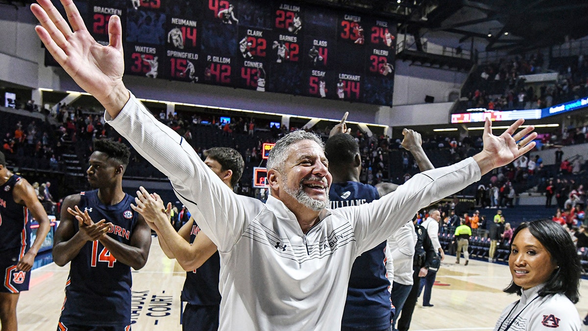 Auburn head coach Bruce Pearl celebrates a win over Mississippi after an NCAA college basketball game in Oxford, Miss., Saturday, Jan. 15, 2022. 