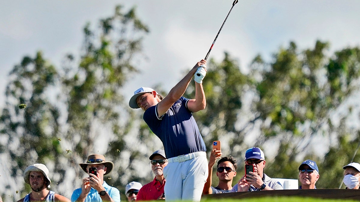 Cameron Smith plays his shot from the 11th tee during the second round of the Tournament of Champions golf event, Friday, Jan. 7, 2022, at Kapalua Plantation Course in Kapalua, Hawaii.