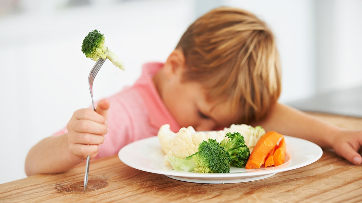 boy with vegetables