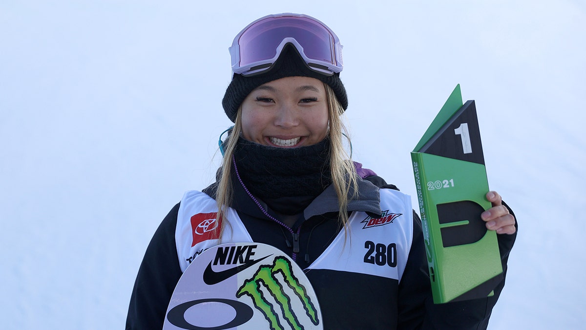 Chloe Kim of Team United States poses for a picture after winning the women's snowboard superpipe final during Day 5 of the Dew Tour at Copper Mountain on Dec. 19, 2021, in Copper Mountain, Colorado. 