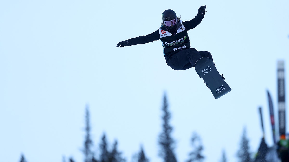 Chloe Kim of Team United States takes a warm-up run before competing in the women's snowboard superpipe final during Day 5 of the Dew Tour at Copper Mountain on Dec. 19, 2021, in Copper Mountain, Colorado. 