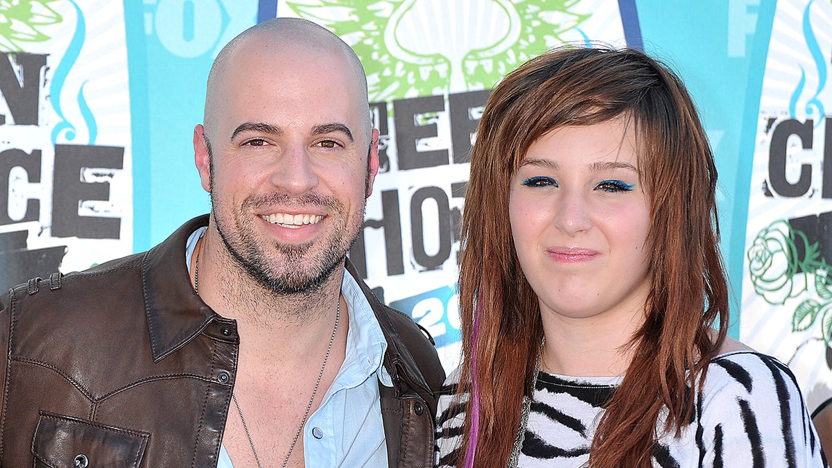 Chris Daughtry and his stepdaughter Hannah Price in 2010. The musician and his family said on Wednesday that she died by suicide.