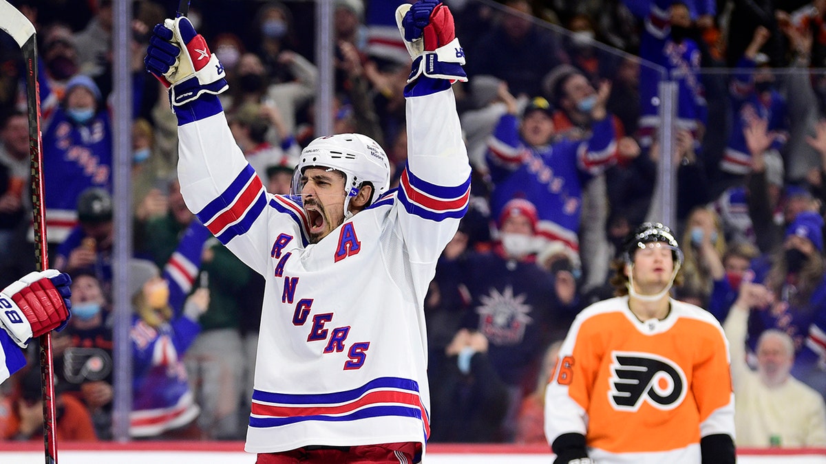 New York Rangers' Chris Kreider celebrates after scoring a goal during the third period of an NHL hockey game against the Philadelphia Flyers, Saturday, Jan. 15, 2022, in Philadelphia. The Rangers won 3-2. 