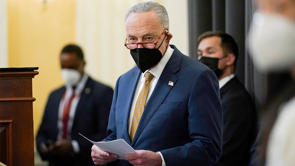 Senate Majority Leader Chuck Schumer of N.Y., waits to speak during an event to mark one year since the U.S. Capitol insurrection on Capitol Hill in Washington, Jan. 6, 2022.