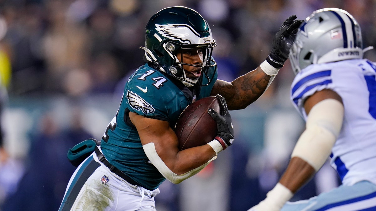 Philadelphia Eagles running back Kenneth Gainwell runs with the ball during the first half of an NFL football game against the Dallas Cowboys, Saturday, Jan. 8, 2022, in Philadelphia. (AP Photo/Julio Cortez)