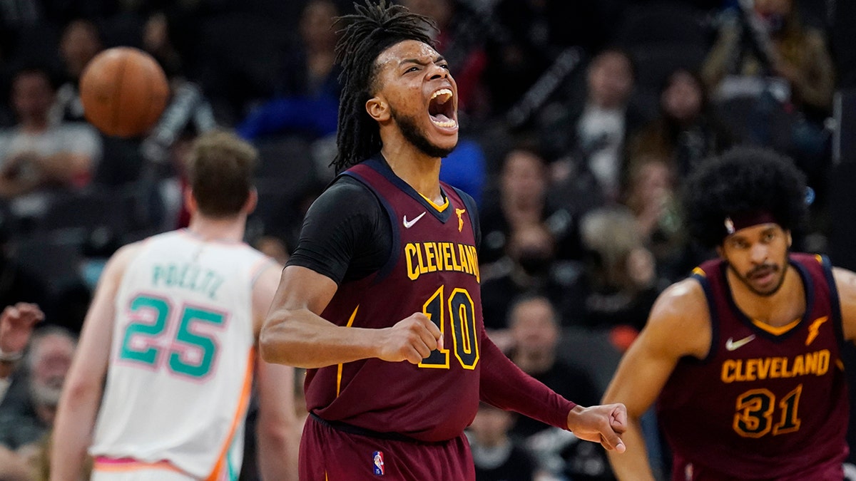 Cleveland Cavaliers guard Darius Garland (10) reacts after scoring against the San Antonio Spurs during the second half of an NBA basketball game, Friday, Jan. 14, 2022, in San Antonio.