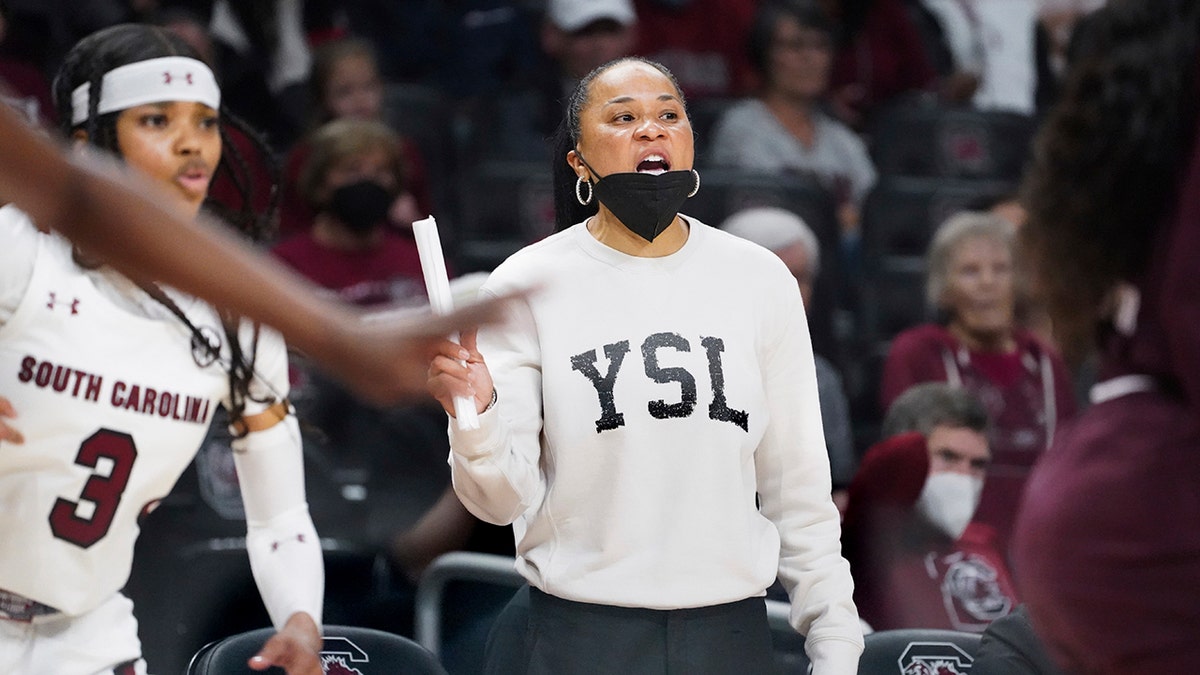 South Carolina head coach Dawn Staley communicates with players during the second half of an NCAA college basketball game against Mississippi State Sunday, Jan. 2, 2022, in Columbia, S.C. South Carolina won 80-68.