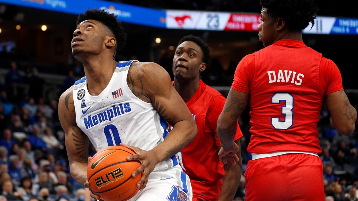 Memphis Tigers guard Earl Timberlake (0) drives to the basket during the first half against the Southern Methodist Mustangs at FedExForum on Jan 20, 2022, in Memphis, Tennessee. 