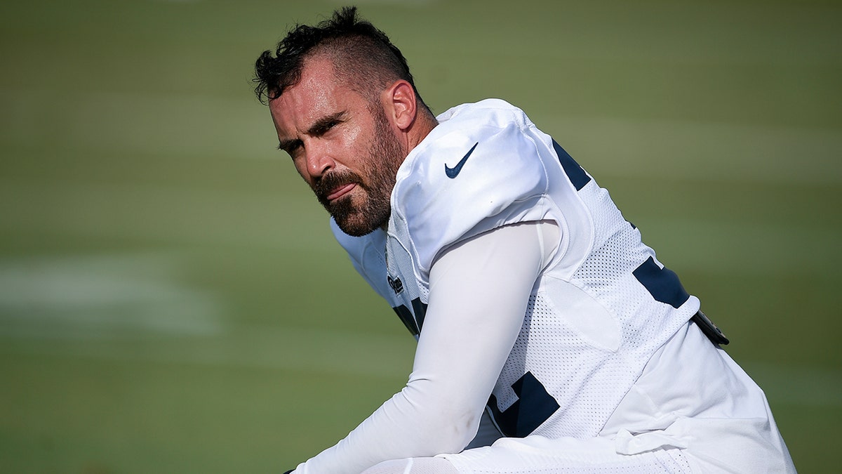 FILE - Los Angeles Rams safety Eric Weddle watches during an NFL football training camp in Irvine, Calif., on July 30, 2019. Weddle is coming out of retirement to rejoin the Los Angeles Rams for the playoffs.