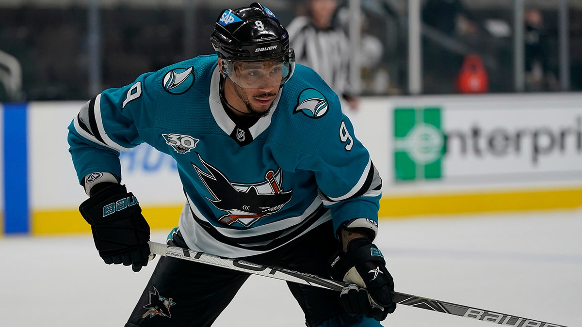 FILE - In this May 12, 2021, file photo, San Jose Sharks' Evander Kane (9) looks on during an NHL hockey game against the Vegas Golden Knights in San Jose, Calif.