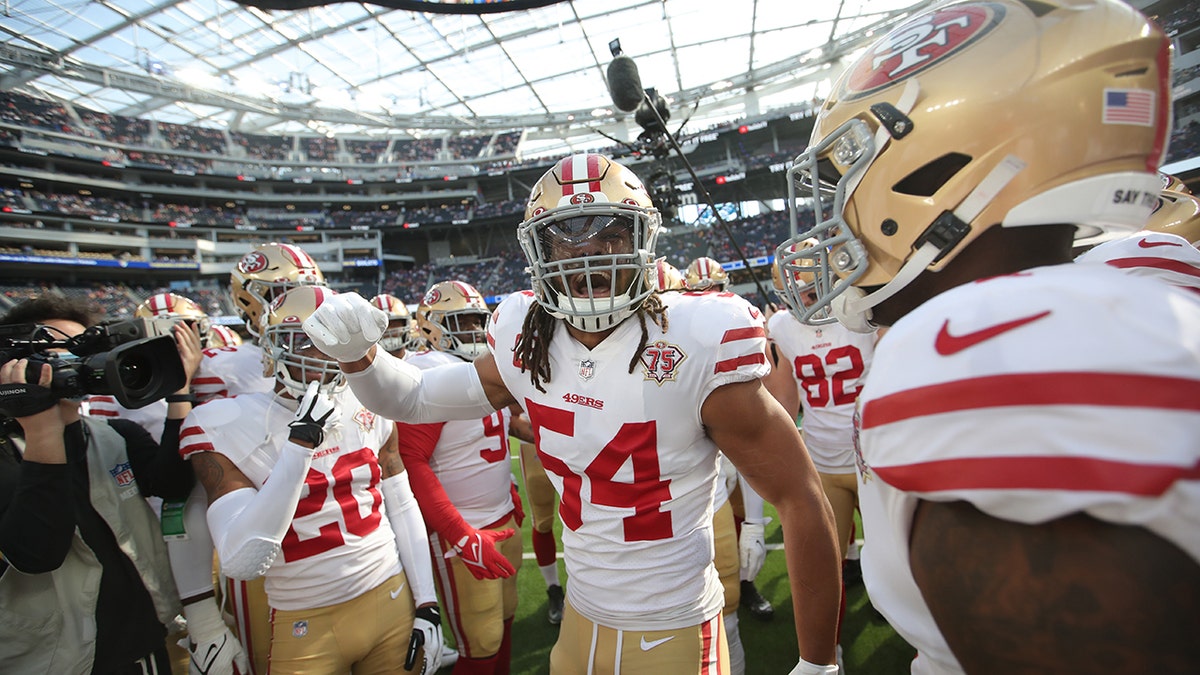 Fred Warner #54 of the San Francisco 49ers fires up the team on the field before the game against the Los Angeles Rams at SoFi Stadium on January 9, 2022 in Inglewood, California. The 49ers defeated the Rams 27-24.