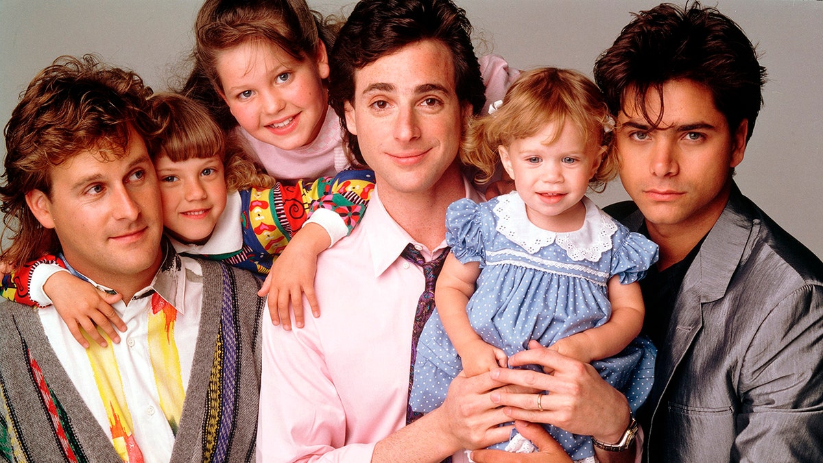 Pictured, from left: Dave Coulier (Joey), Jodie Sweetin (Stephanie), Candace Cameron (D.J.), Bob Saget (Danny), Ashley Olsen (Michelle), John Stamos (Jesse) of "Full House." 