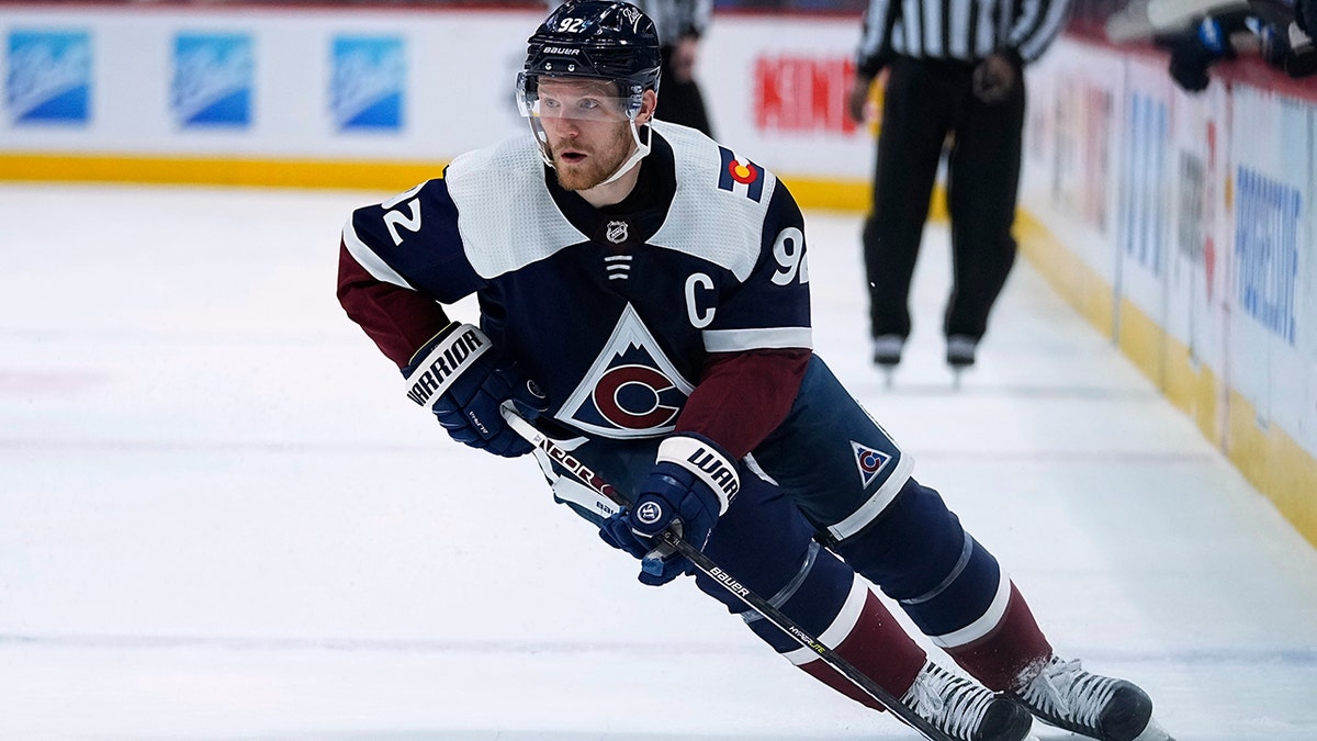 Colorado Avalanche left wing Gabriel Landeskog (92) skates against the Winnipeg Jets during the third period of an NHL hockey game Thursday, Jan. 6, 2022, in Denver.