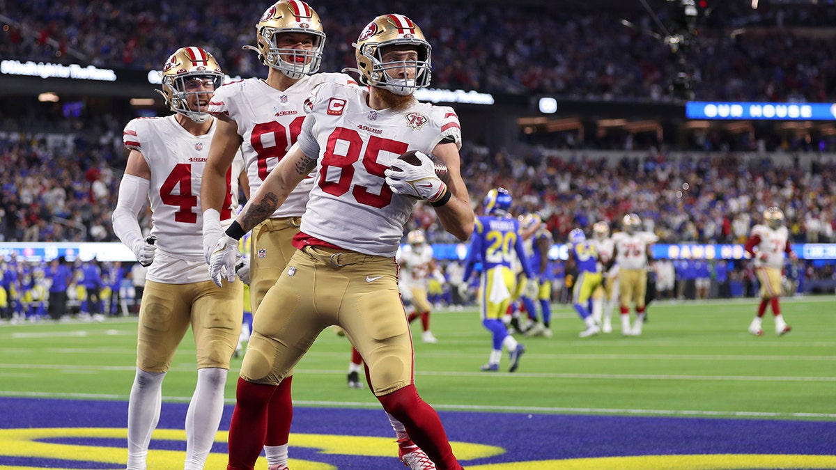 San Francisco 49ers' George Kittle reacts after catching a touchdown pass during the NFC Championship game against the Los Angeles Rams Sunday, Jan. 30, 2022, in Inglewood, California.