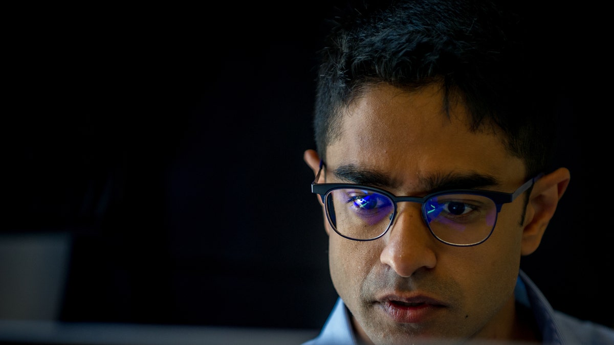 Saikat Chakrabarti, former chief of staff for Rep. Alexandria Ocasio-Cortez, D-NY working in his office
