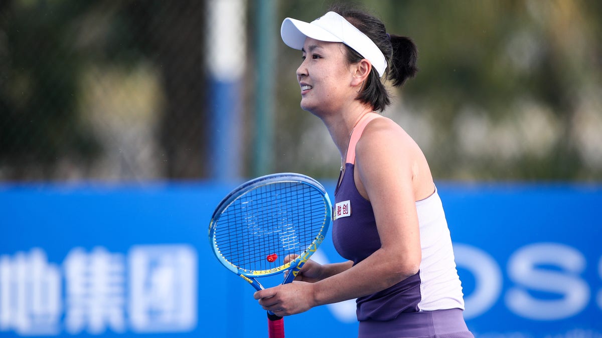 Shuai Peng of China celebrates a shot during the match against Lin Zhu of China on Day 2 of 2020 WTA Shenzhen Open at Shenzhen Longgang Sports Center on Jan. 6, 2020, in Shenzhen, China.