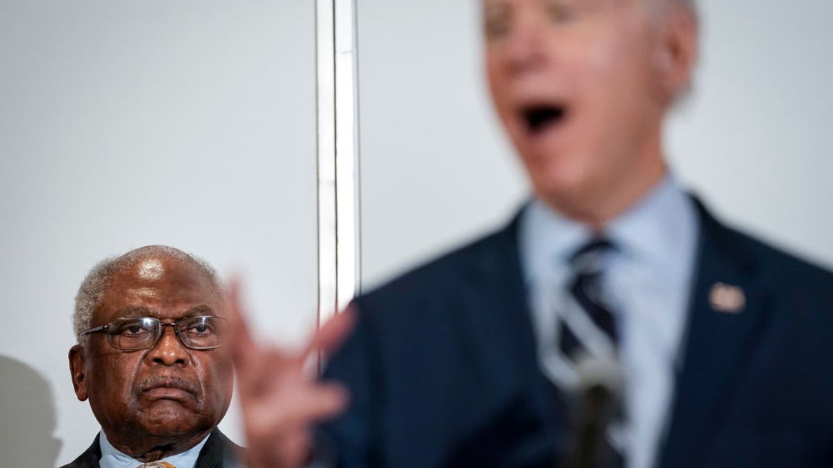 Whip James Clyburn, D-S.C., looks on as President Joe Biden speaks