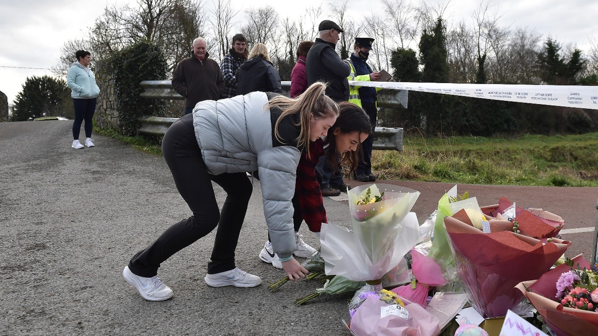 TULLAMORE, IRELAND - JANUARY 14: Well wishers leave flowers at the murder scene of Ashling Murphy on January 14, 2022 in Tullamore, Ireland. The 23-year-old school teacher was attacked on the banks of the Grand Canal outside Tullamore whilst out jogging on Wednesday afternoon and died at the scene. A 40-year-old man arrested over her murder has been released "and is no longer a suspect", police said. (Photo by Charles McQuillan/Getty Images)