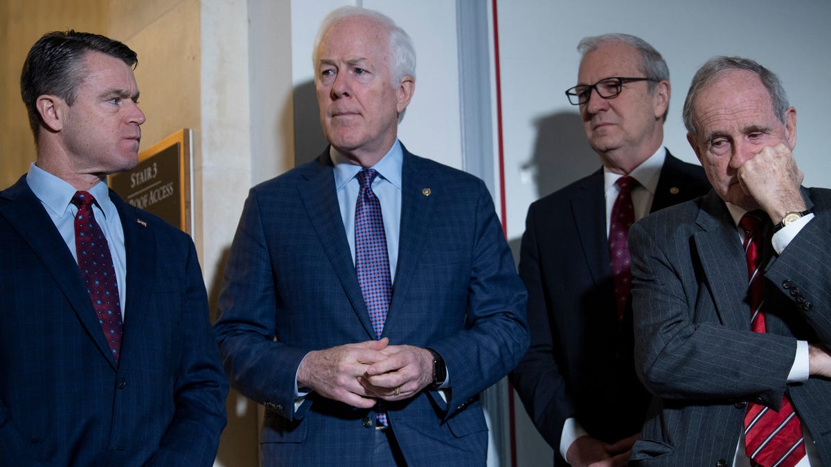 Republican Sens. Todd Young, John Cornyn, Kevin Cramer and Foreign Relations Committee Ranking Member Jim Risch listen while Republican members of the Senate Armed Services Committee and the Foreign Relations Committee speak.
