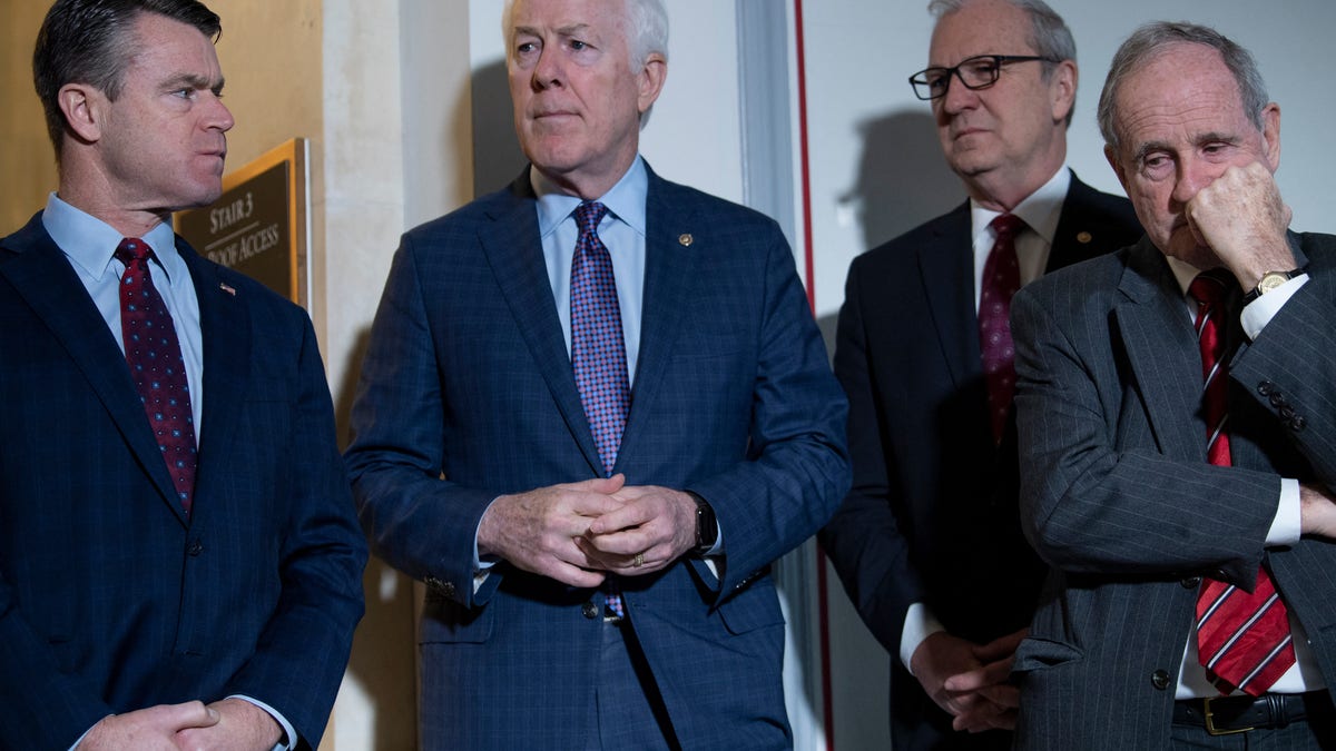 Republican Sens. Todd Young, John Cornyn, Kevin Cramer and Foreign Relations Committee Ranking Member Jim Risch listen while Republican members of the Senate Armed Services Committee and the Foreign Relations Committee speak.