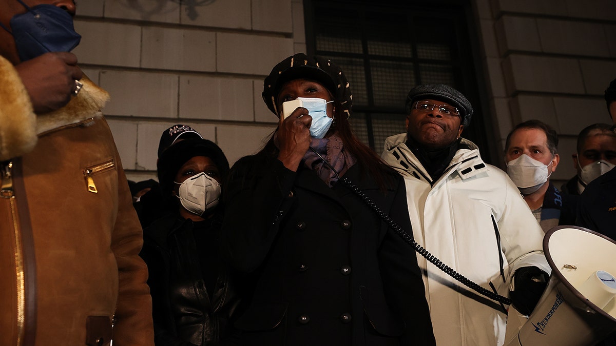 Ingrid Lewis-Martin, chief adviser to New York City Mayor Eric Adams, speaks Saturday night as hundreds of police officers and firefighters honor two officers who were shot in Harlem on Friday night.