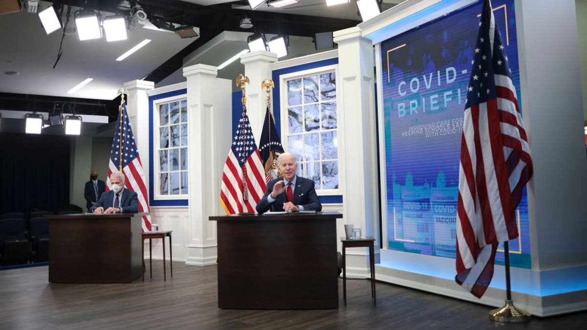 WASHINGTON, DC - JANUARY 04: U.S. President Joe Biden speaks during a meeting of the White House COVID-19 Response Team as Dr. Anthony Fauci (L) listens January 4 , 2022 in Washington, DC. (Photo by Win McNamee/Getty Images)
