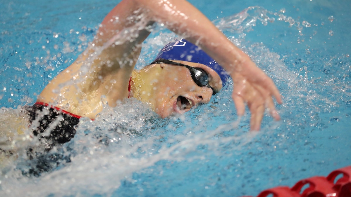 Lia Thomas of the Pennsylvania Quakers swims in the 500 yard freestyle event