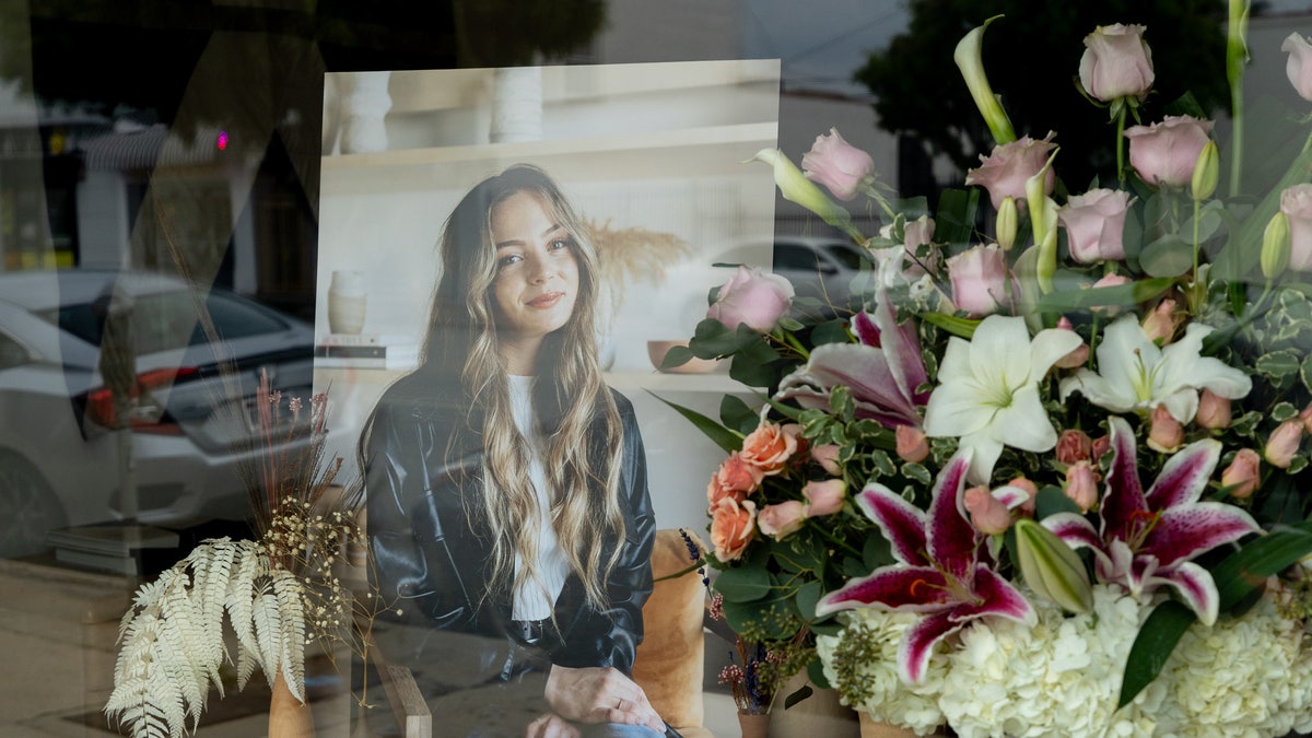 Flowers are placed outside Croft House furniture store in memory of graduate student Brianna Kupfer. Kupfer was stabbed to death while working in the store on Thursday January 13th in Los Angeles. 