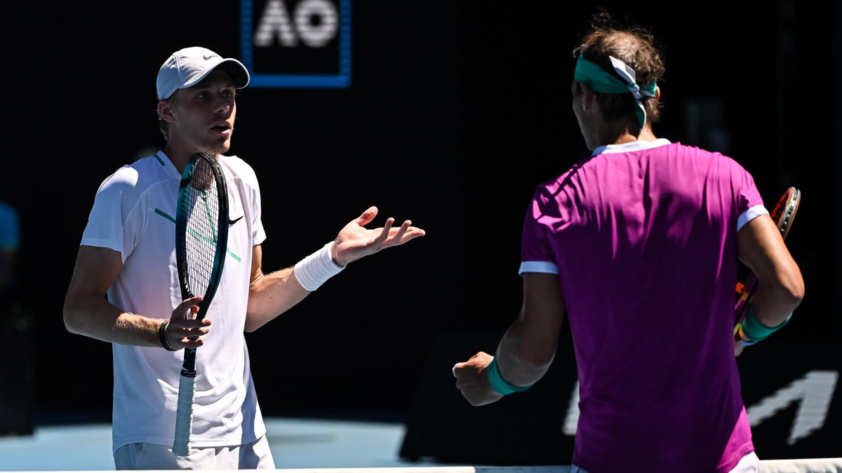 Dennis Shapovalov of Canada complains about how much time Rafael Nadal of Spain is taking between points during day nine of the 2022 Australian Open at Melbourne Park on Jan. 25, 2022, in Melbourne, Australia. 
