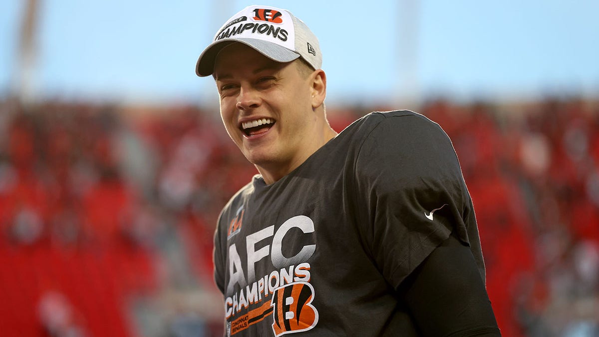 Quarterback Joe Burrow #9 of the Cincinnati Bengals reacts after the Bengals defeated the Kansas City Chiefs to win the AFC Championship Game at Arrowhead Stadium on January 30, 2022 in Kansas City, Missouri.