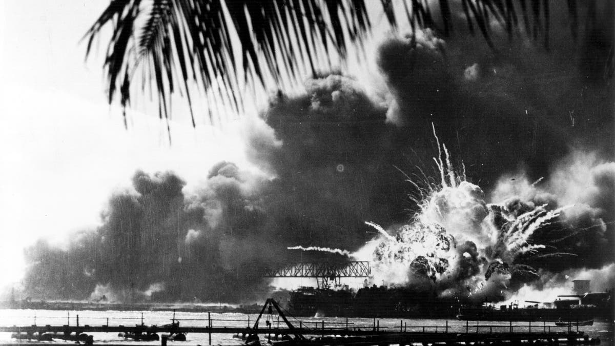 Japan attacks Pearl Harbor, forcing Americans into World War II