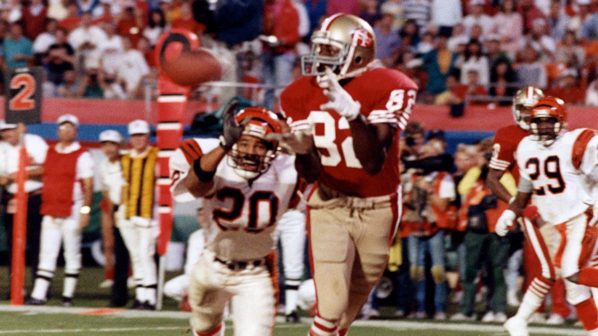 Wide receiver John Taylor #82 of the San Francisco 49ers catches the game-winning 10-yard touchdown reception in the final moments of the 49ers 20-16 victory over the Cincinnati Bengals in Super Bowl XXIII on January 22, 1989 at Joe Robbie Stadium in Miami, Florida. ?