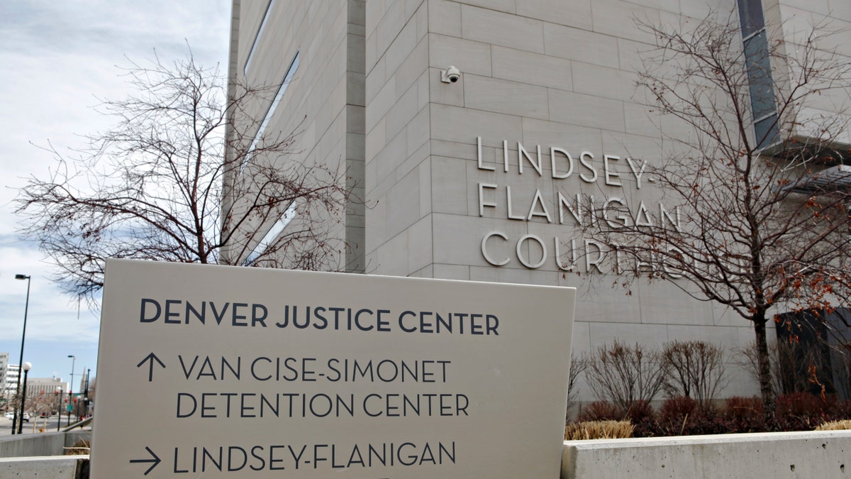 DENVER, CO - March 09: A sign for the Denver Justice Center in front of the Lindsey-Flanigan Courthouse which serves all of Denver County and is located in downtown Denver, Colorado on March 9, 2016.