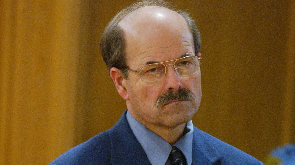 Dennis Rader frowns in court