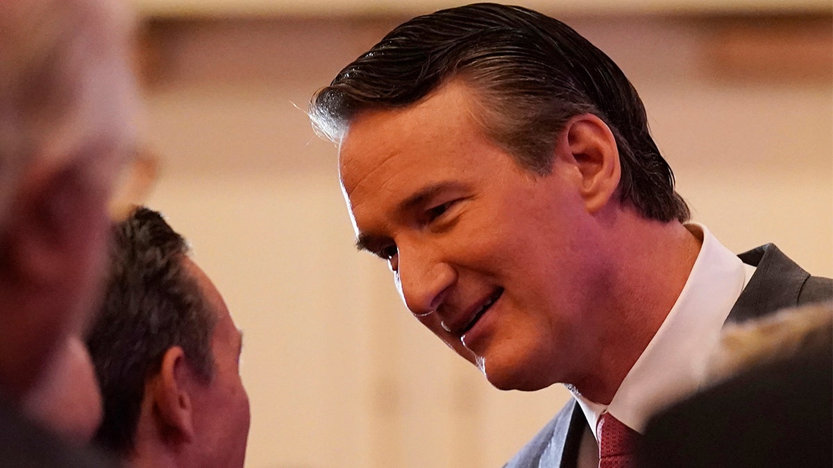 Virginia Gov.-elect Glenn Youngkin greets supporters at a reception Friday Jan. 14, 2022, in Richmond, Virginia.