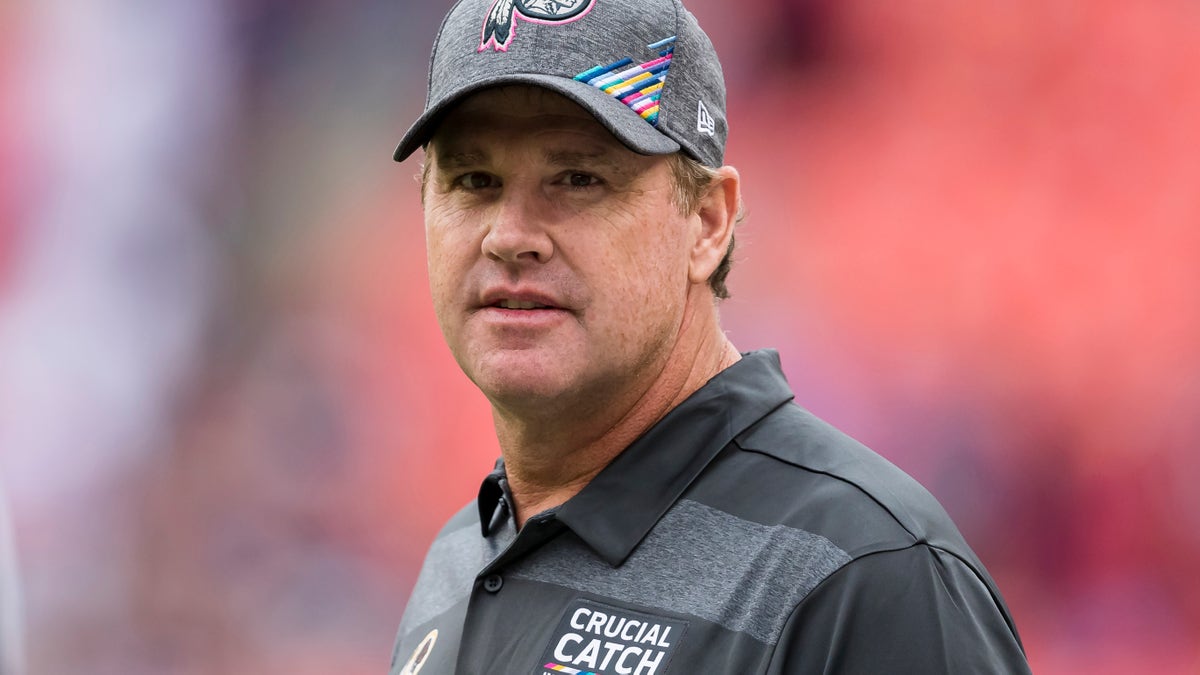Head coach Jay Gruden of the Washington Redskins looks on before the game against the New England Patriots at FedExField on October 6, 2019 in Landover, Maryland. (Photo by Scott Taetsch/Getty Images)